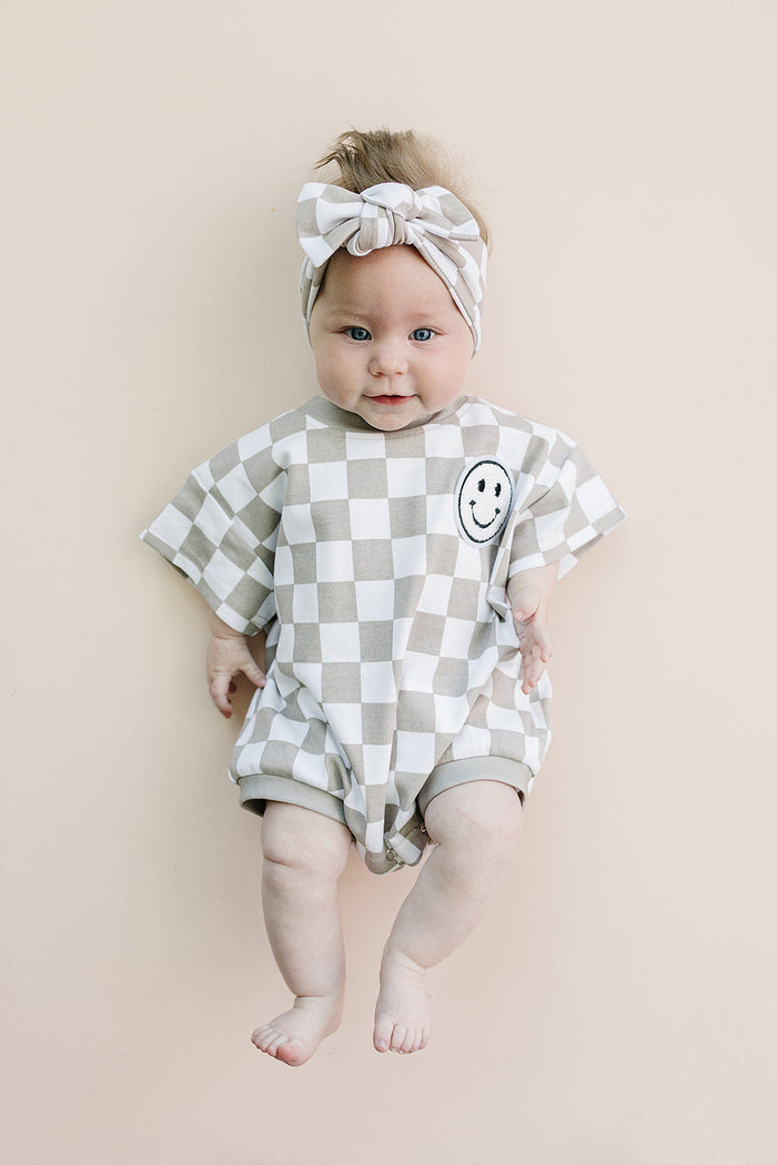 Short Sleeve Bubble Romper | Checkered Smiley Latte