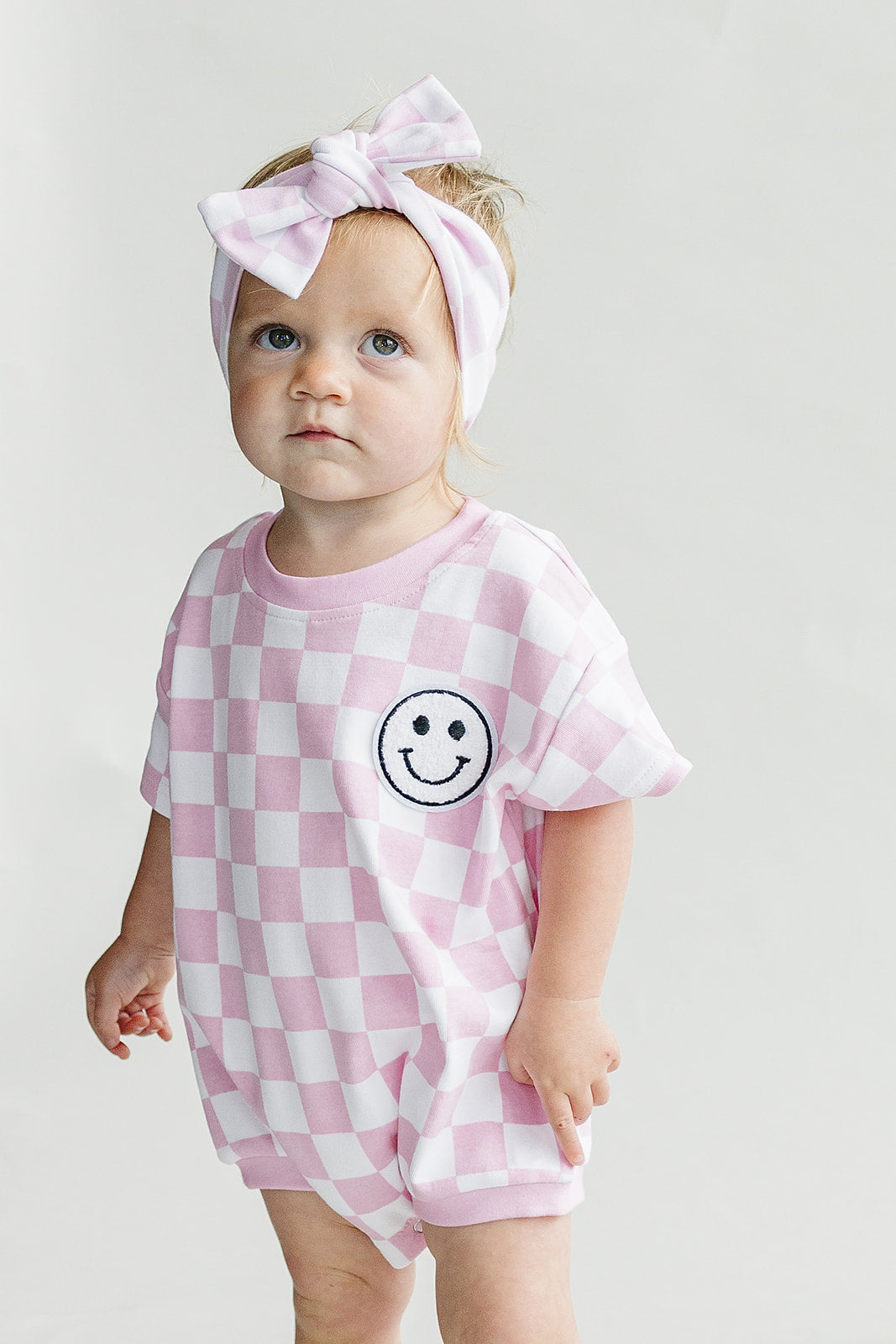 Short Sleeve Bubble Romper | Checkered Smiley Pink