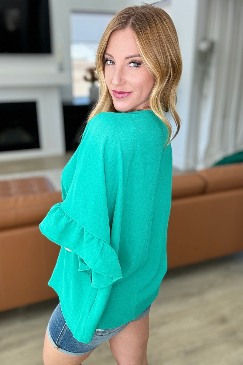 Airflow Peplum Ruffle Sleeve Top in Emerald - Mack and Mav Boutique 