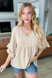 Airflow Peplum Ruffle Sleeve Top in Taupe - Mack and Mav Boutique 