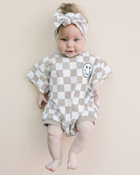 Short Sleeve Bubble Romper | Checkered Smiley Latte