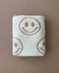 Smiley Fuzzy Blanket | Latte